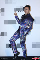 组图：章子怡卷发造型亮相活动