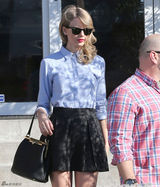 组图：泰勒斯威夫特性感短裙出街 猛男贴身紧随