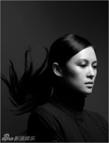 幻灯图：章子怡再登杂志封面 造型摩登眼神魅惑