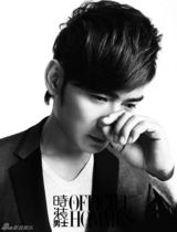 组图：焦恩俊登《时装》 变身书香气质男编辑