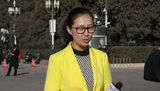 组图：2014两会美女记者众生态 美貌智慧并存