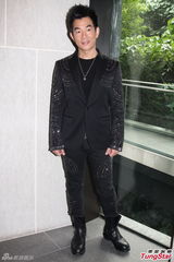 高清图：梁家辉出席活动 自曝保持身材秘笈