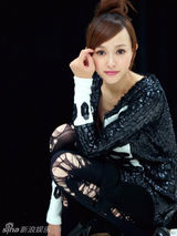 幻灯图：唐嫣时尚写真 甜美精灵美丽蜕变