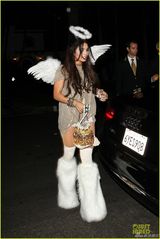 组图:群星惊悚亮相万圣节派对莱昂纳多变蒙面人