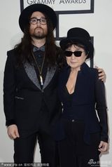 组图：56届格莱美红毯 泰勒透视麦当娜反串绅士