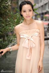 组图：原雨曝光最新写真 可爱女孩造型百变