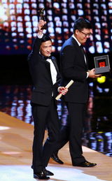 组图：张家辉凭《激战》获最佳男演员奖