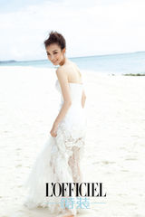 组图：倪妮甜美婚纱登杂志封面 裙摆随风飘逸