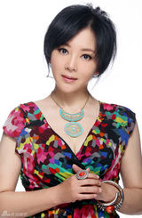 组图：梁丽妖娆写真出炉淡定优雅