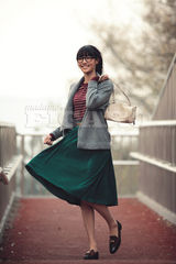 组图：白百何冬日街拍身着雅致演绎军绿回潮