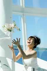 高清图：俏主播王婧关岛写真 祝福虎年恭贺新春