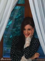 组图：李嘉欣近照曝光孕相不明显 亲吻外甥脚丫