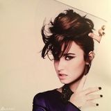 组图：黛米-洛瓦托妩媚写真 黑色蕾丝蒙面神秘