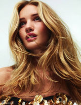 组图：变女郎罗茜-汉丁顿《ELLE》大片玉腿秀场