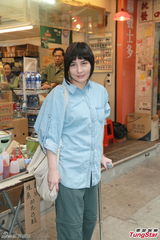 组图：何超仪为演活角色 不惜倒垃圾洗碗