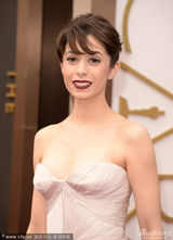 组图：米莉奥迪白裙亮相奥斯卡 黑唇似中毒