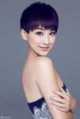 组图：穆婷婷露香肩美背 演绎性感“灰姑娘”