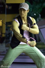 幻灯图：姚雨鑫拍写真大秀肌肉 健身中显男人本色