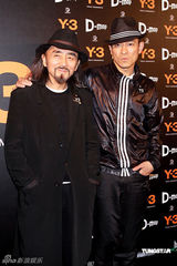 幻灯图：刘德华潮人装出席时尚活动 赞犀利哥有型