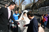 组图：直击袁莉北京婚礼现场 幸福新娘笑容满面