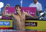 组图：法国泳坛美男展现性感运动魅力
