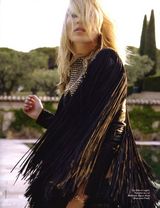 组图：凯特-莫斯高贵优雅装扮登法国Elle封面