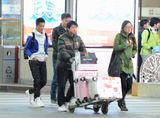 高清组图：韩庚低调秘密回京 机场“放空”