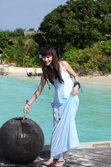 组图：韩雪浪漫海滩湿身照清新动人