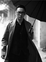 组图：吴秀波突破造型 演绎邪魅黑白大片