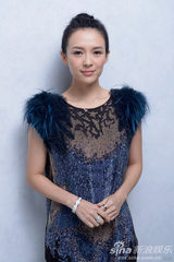 组图：章子怡张东健多伦多拍写真展魅力