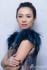 组图：章子怡张东健多伦多拍写真展魅力